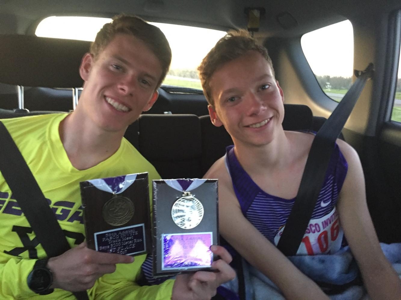 Senior Austin Byrer and freshman Caden Byrer in the aftermath of state track May 20. Austin Byrer won second in the 1,600-meter event and first place honors in the 3,200-meter event. 