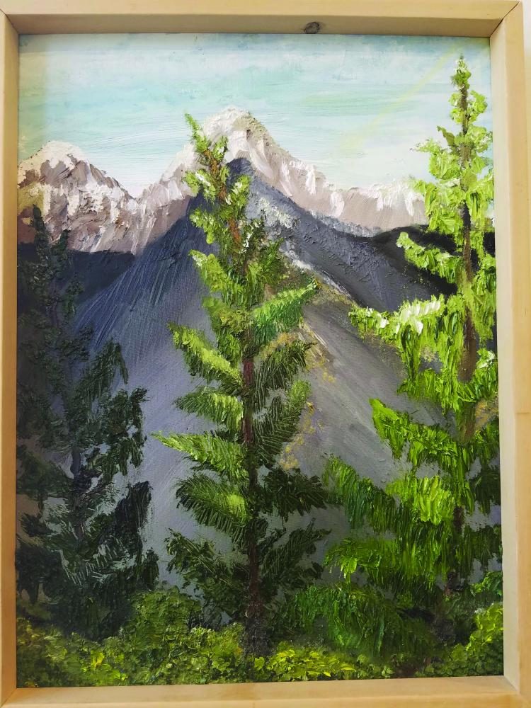 Morgan Glidden’s “Wallowa Pines” hangs at LCSC Center for Arts and History in Lewiston April 29. 