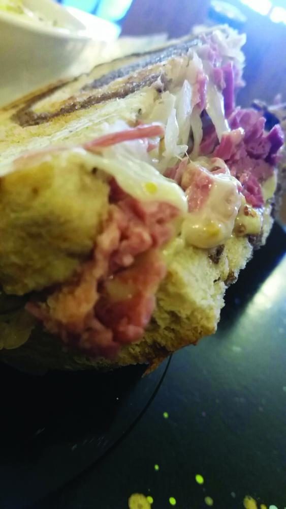 Cafe Reuben’s  signature sandwich waits to be eaten
