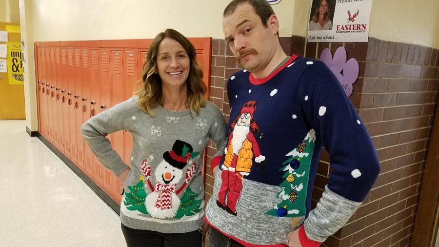 LHS teachers Molly Hendrickson and Matt Dabbs prepare for the Christmas assembly in festive sweaters.