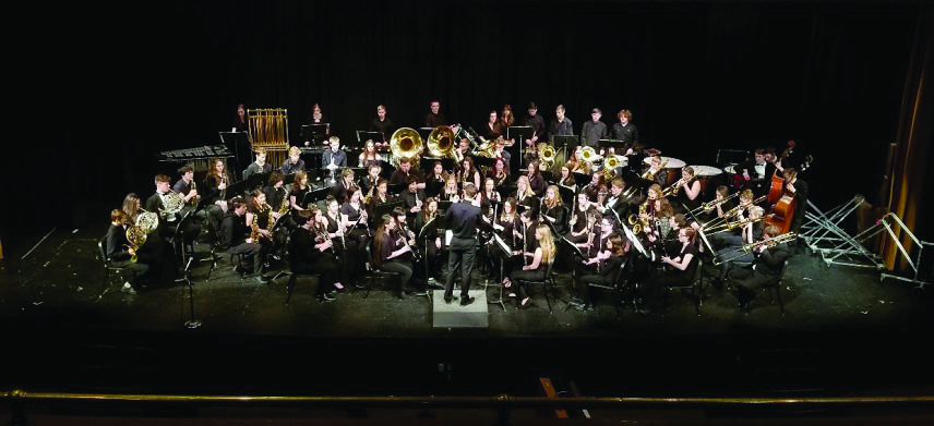 Clad in black, Lewiston High Schools band performs together at the regional music competition April 19, 2018, at LHS. 