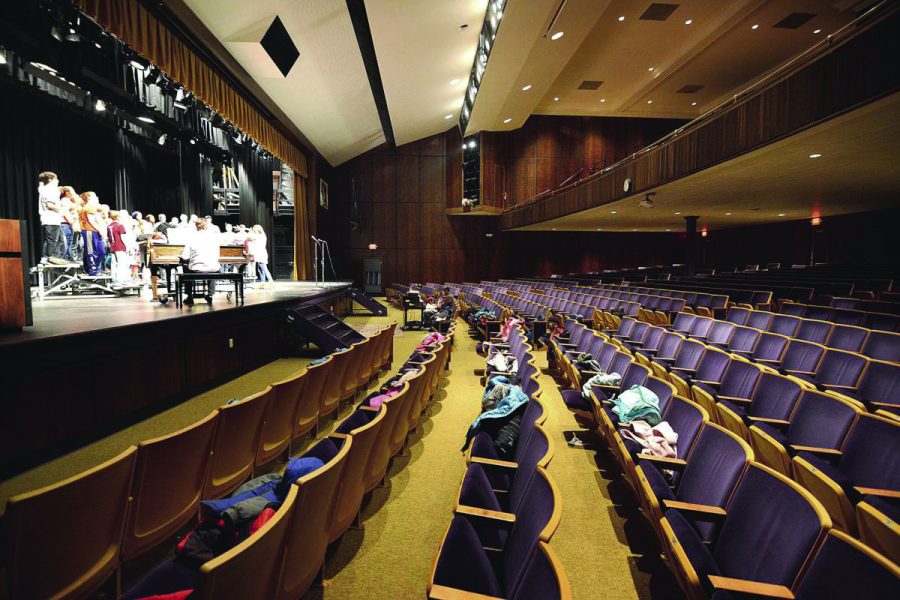LHS+music+department+students+leave+their+backpacks+laying+in+the+arms+of+the+auditorium+seats.+Photo+by+Gracyn+Richardson.