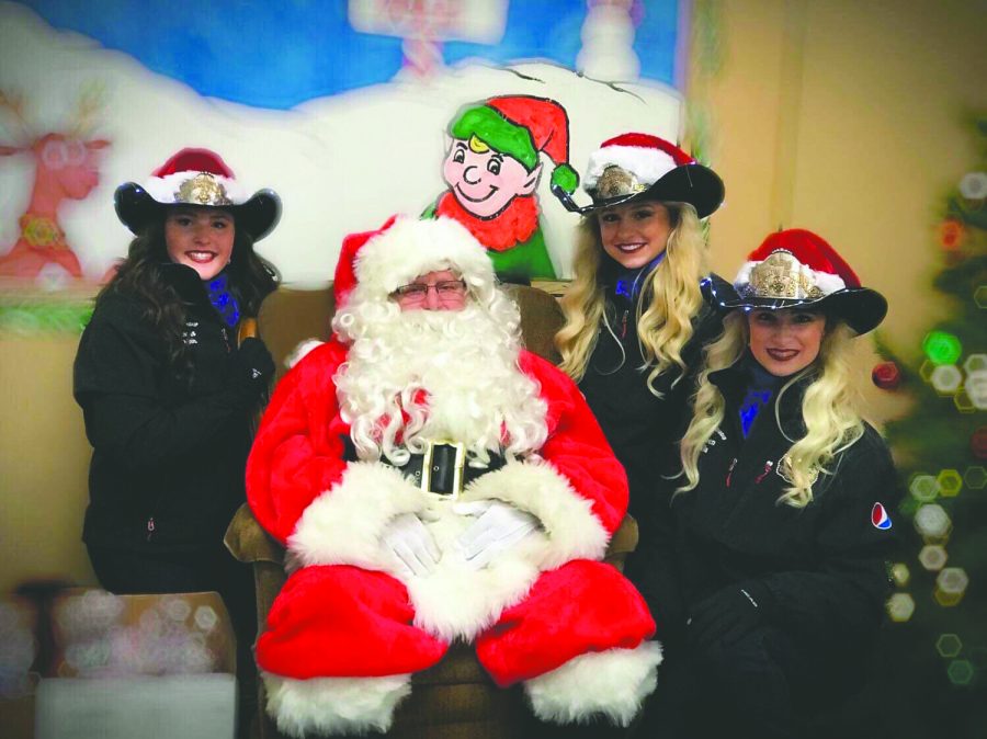 Lewiston's Roundup Royalty paid a visit to Santa on Dec. 9. Photo courtesy of Amie Greenfield. 