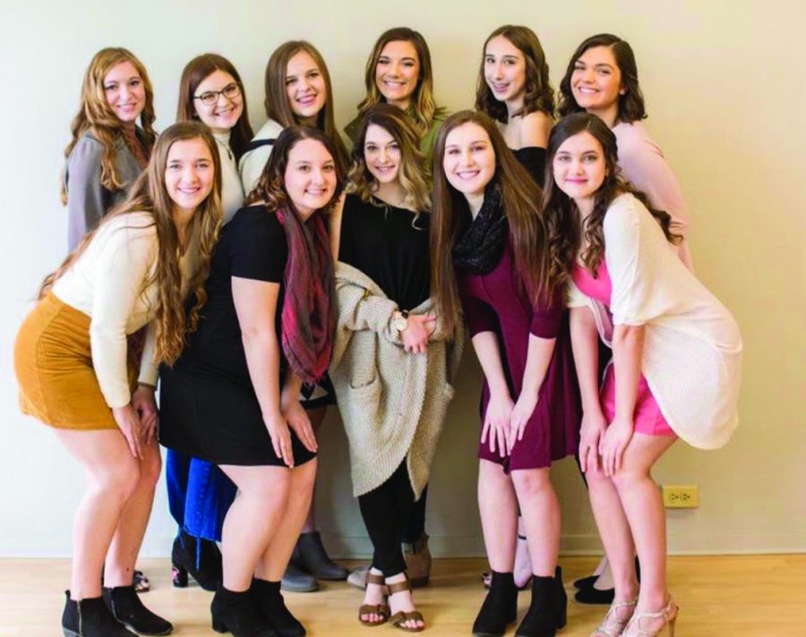 The 2019 Distinguished Young Woman team show smiles at a photoshoot in late March. 