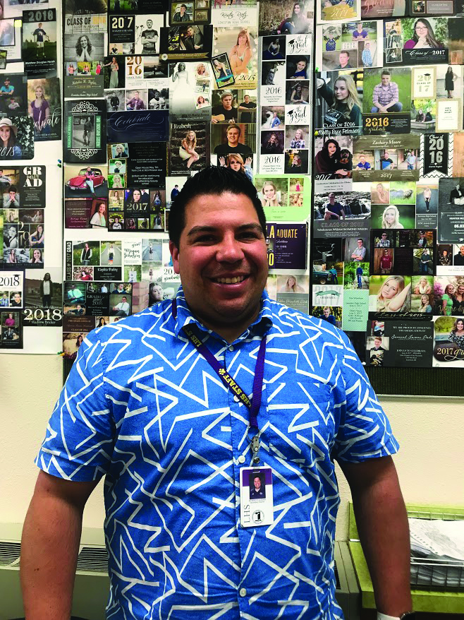 Ricky Guzman stands for a photo in his classroom at LHS. 