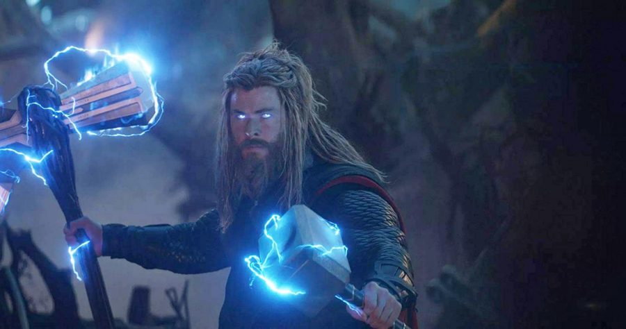 Thor+%28Chris+Hemsworth%29+debuts+his+new+look+while+wielding+both+Stormbreaker+and+Mjolnir.+