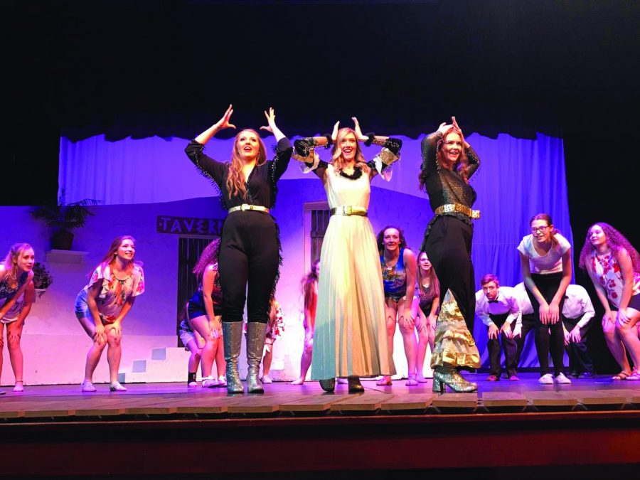 Clarkston High School actors perform in Mamma Mia. From Left to Right: Molly Williams, Keely Burnes, Abby Vance. 