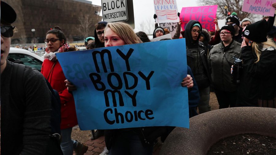 A poster reads “My body, my choice“ at the 2019 Women’s March. 