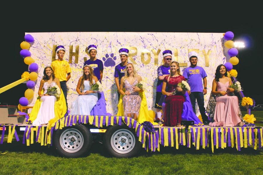 The+2019+Homecoming+Royalty+sits+atop+a+float+made+by+LHS+Leadership.+Photo+by+Josie+Hafer.+