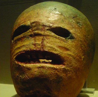 A carved turnip for Halloween.