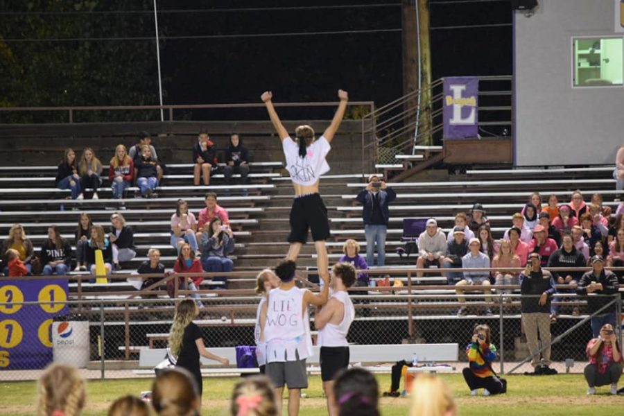 LHS+boys+demonstrate+excellent+cheer-leading+skills+at+2019+Powderpuff+football+game.+Photo+courtesy+of+Mindy+Pals