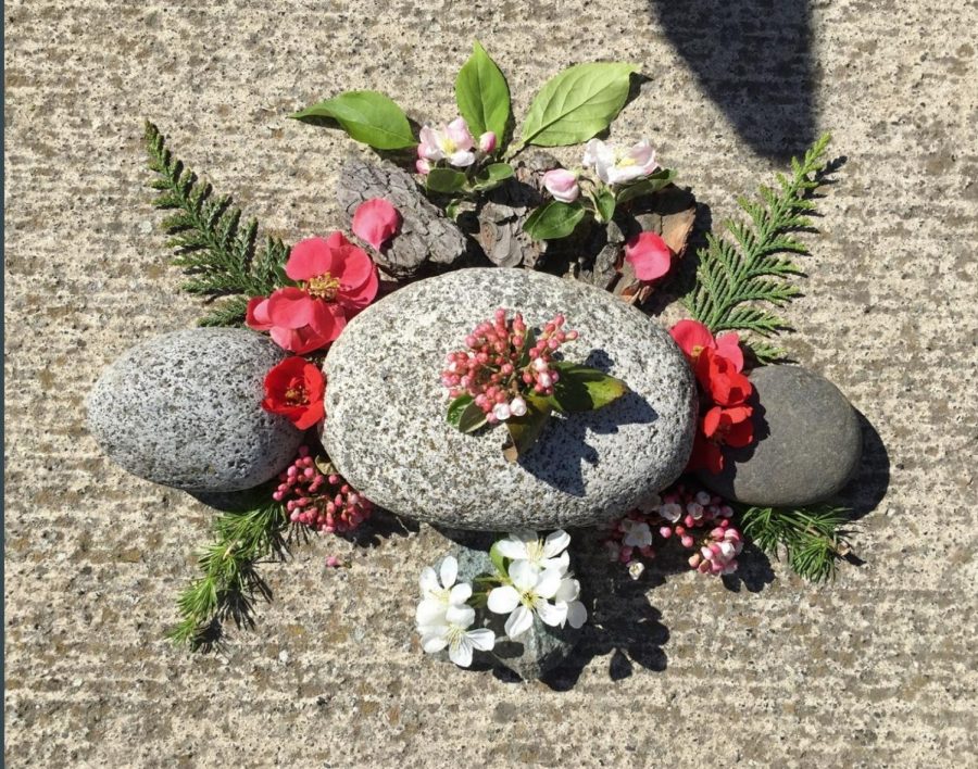 One students take on springtime land art. Art by Renae McGarry. Photo courtesy of Scout Larson. 