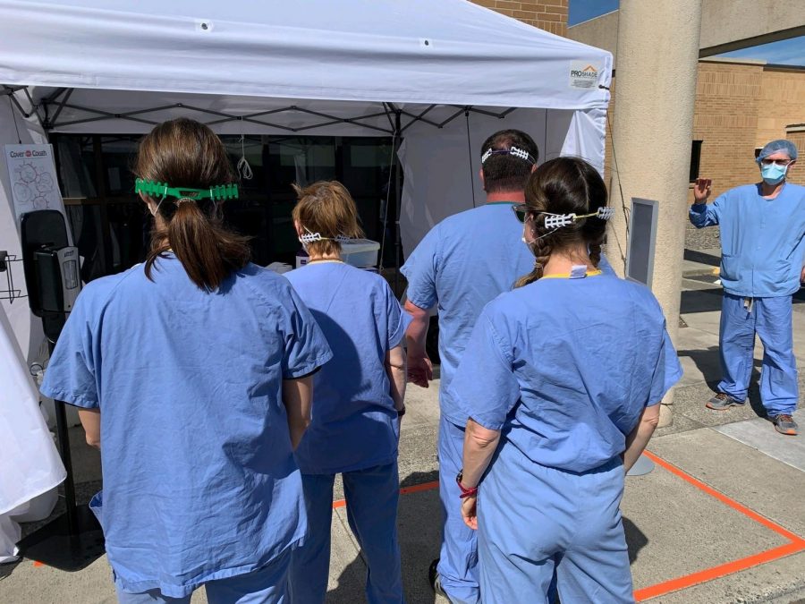 Nurses trying out the ear protectors at Tri-State.