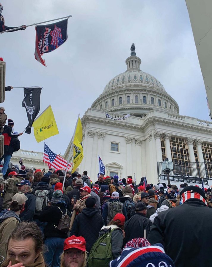 A+crowd+gathers+in+front+of+the+U.S.+Capitol+building+Jan.+6+in+Washington%2C+D.C.+Photo+by+Nina+Linder.%0A