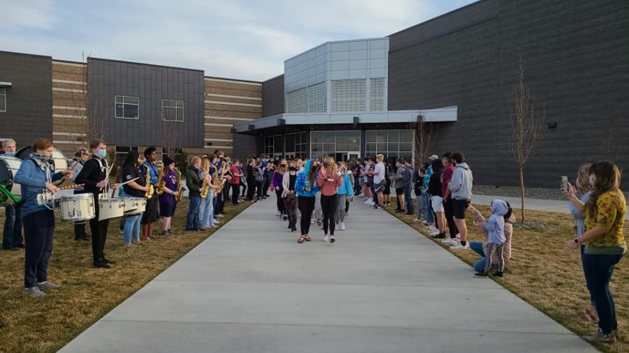 The LHS band and a group of students attend the send-off for the cheer team, as they leave for state. Photo courtesy of Mindy Pals
