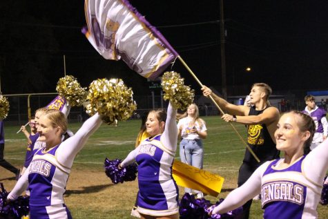 Lewiston High School cheerleaders perform at Bengal field Sept.10 during the game for the annual Battle of the Bridges rivalry football game against the Clarkston High School Bantams. 