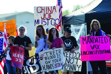 Protestors stand outside of the National Interagency Fire Center in Boise, Idaho, on Sept. 13. Photo courtesy of the Associated Press.