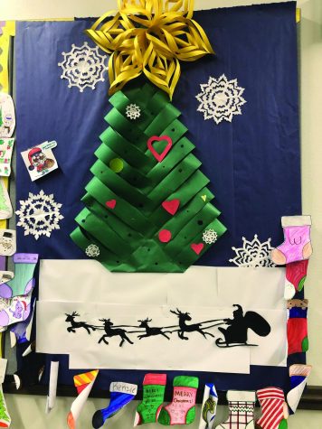  The deocorated classroom doors and bulletin boards at LHS help carry along the holiday spirit. Photo by Chayton Brewer-Burgin. 
