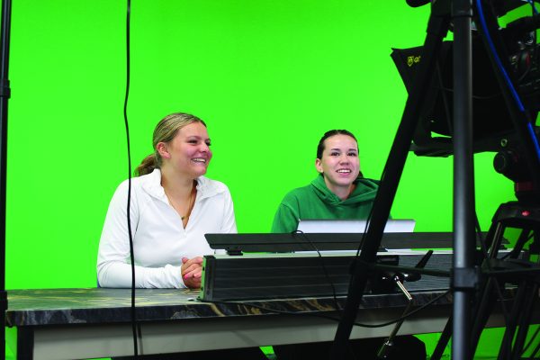 Lillian Samuels and Kaeli Fisher prepare to record the Bengal Update. Photo by McKinley Forth.