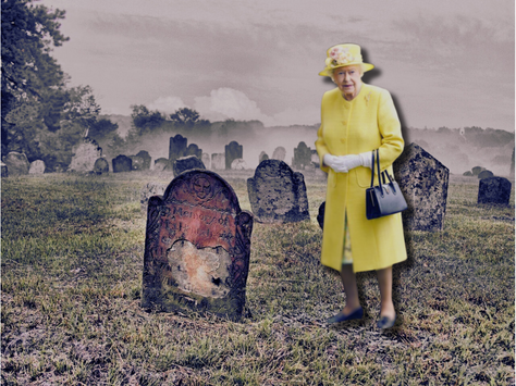 Queen Elizabeth II stands next to a grave. Photo by Declan Cattrysse.