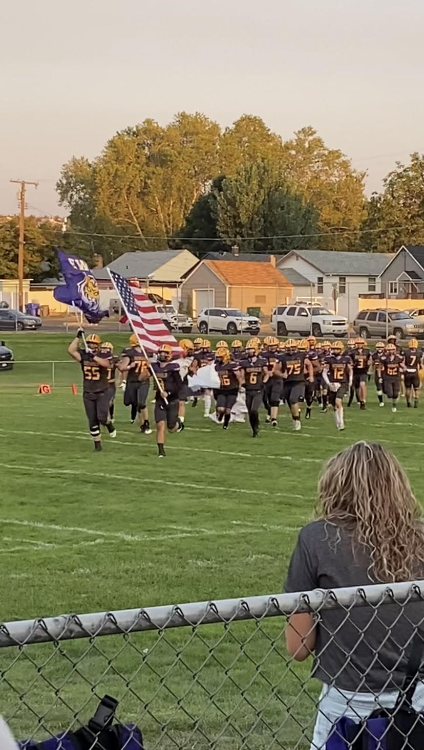 Bengals Football team enters field, Photo by Samuel Huff.