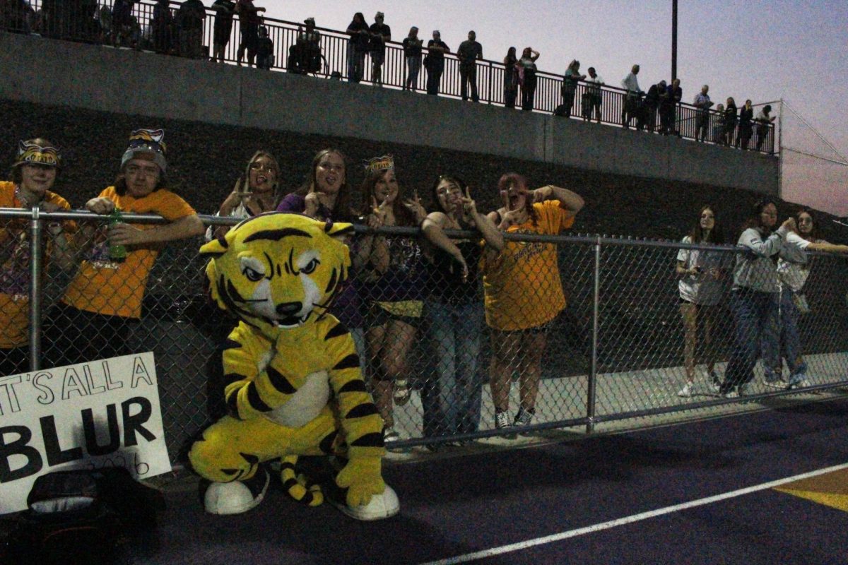 Joe Bengal poses with Lewiston fans during the Battle of the Bridges on Sept. 12