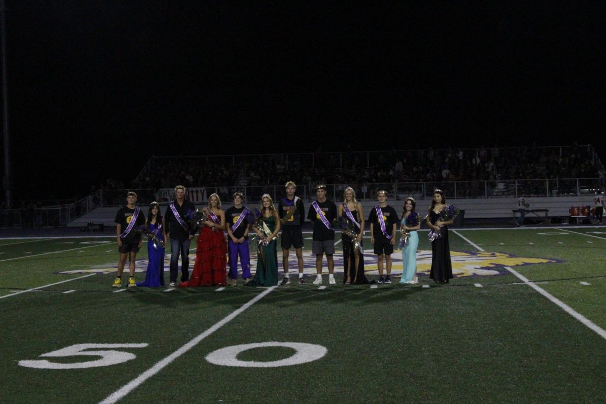 LHS Royalty stands proudly during the halftime 