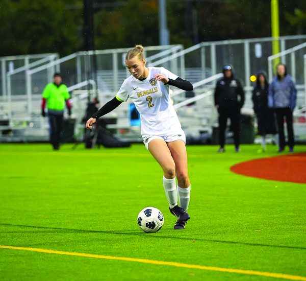 Avery Lathen maneuvers the ball down the field